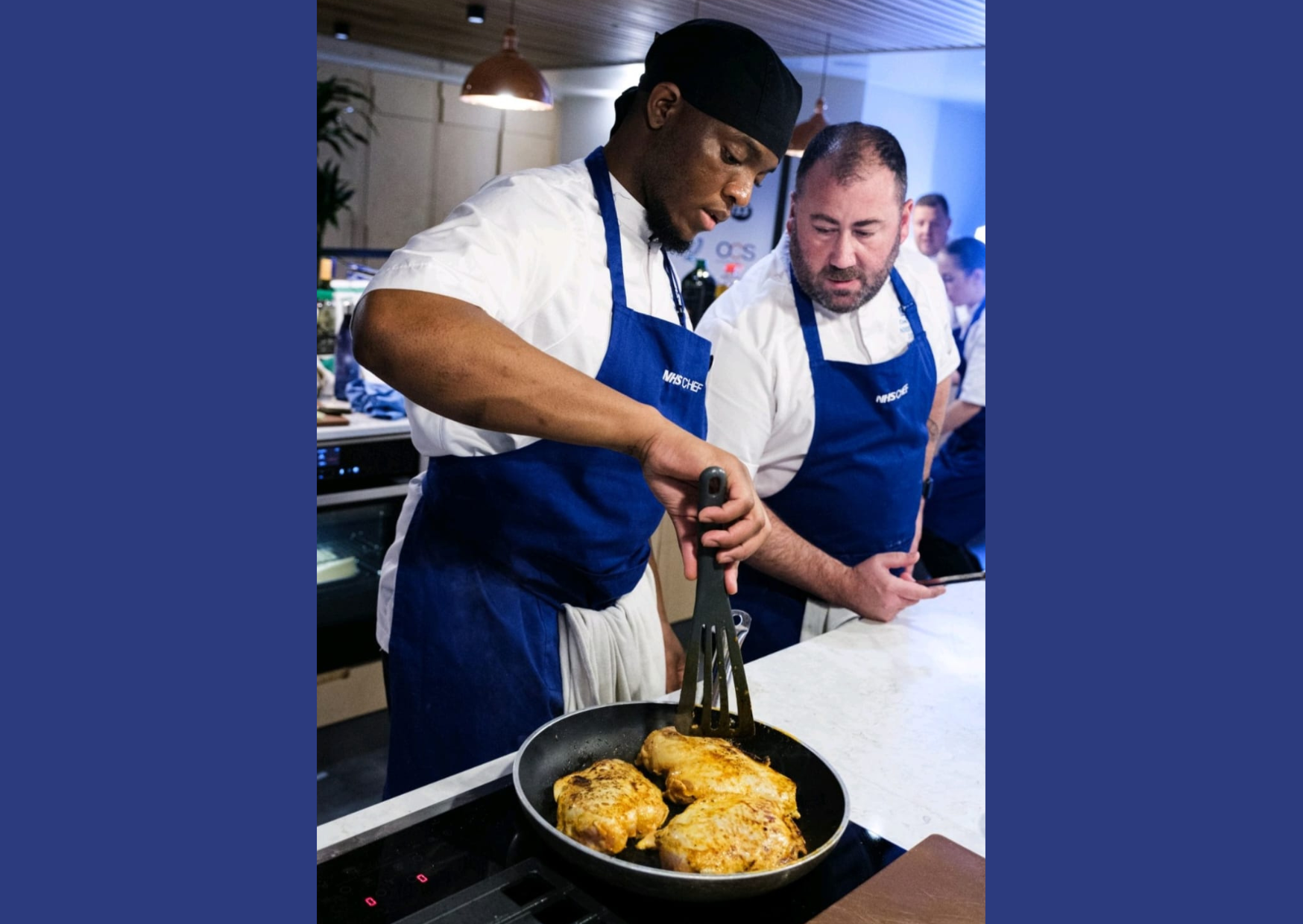 Tremaine and Tom cooking at the NHS Chef of the Year awards 