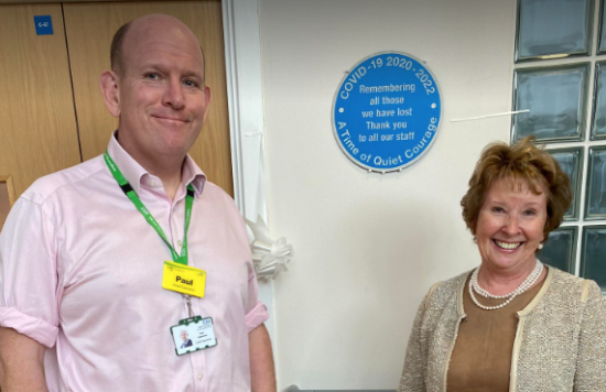 ELFT's Chief Executive, Paul Calaminus and Chair, Eileen Taylor, next to the newly unveiled Covid remembrance plaque at East Ham Care Centre.