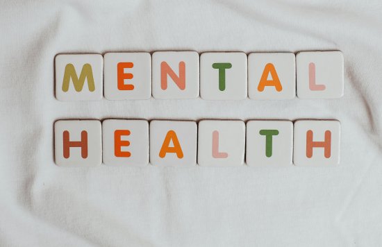 Letter tiles spelling the words mental health