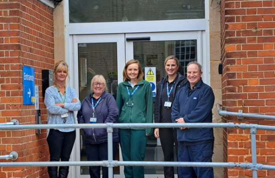 Ed Phillips and the wheelchair services team pictured outside Fothergill Ward